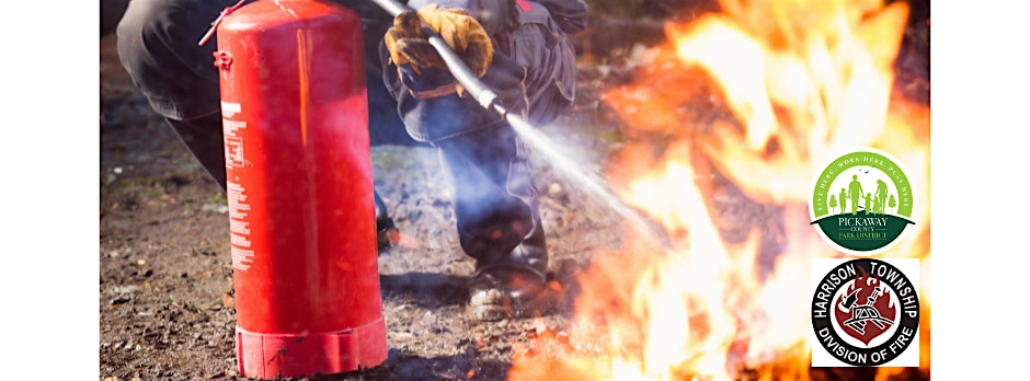 Person using a fire extinguisher during a live fire training exercise, Harrison Township Division of Fire and Pickaway County