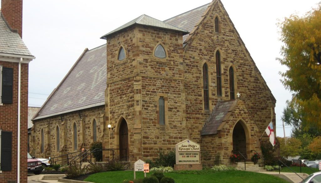 Exterior of a stone church building, similar to Circleville Presbyterian Church, the concert venue