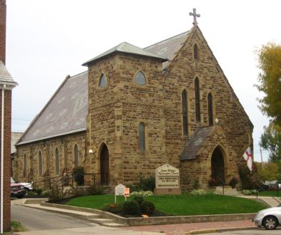Exterior of a stone church building, similar to Circleville Presbyterian Church, the concert venue
